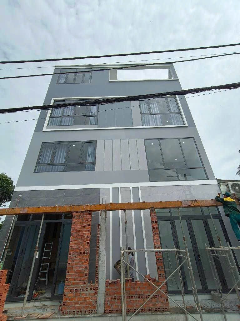 NHÀ BÁN 4 LẦU SÁT MẶT TIỀN - ÔTÔ NGỦ NHÀLÃ XUÂN OAI - TĂNG NHƠN PHÚ A - Q9