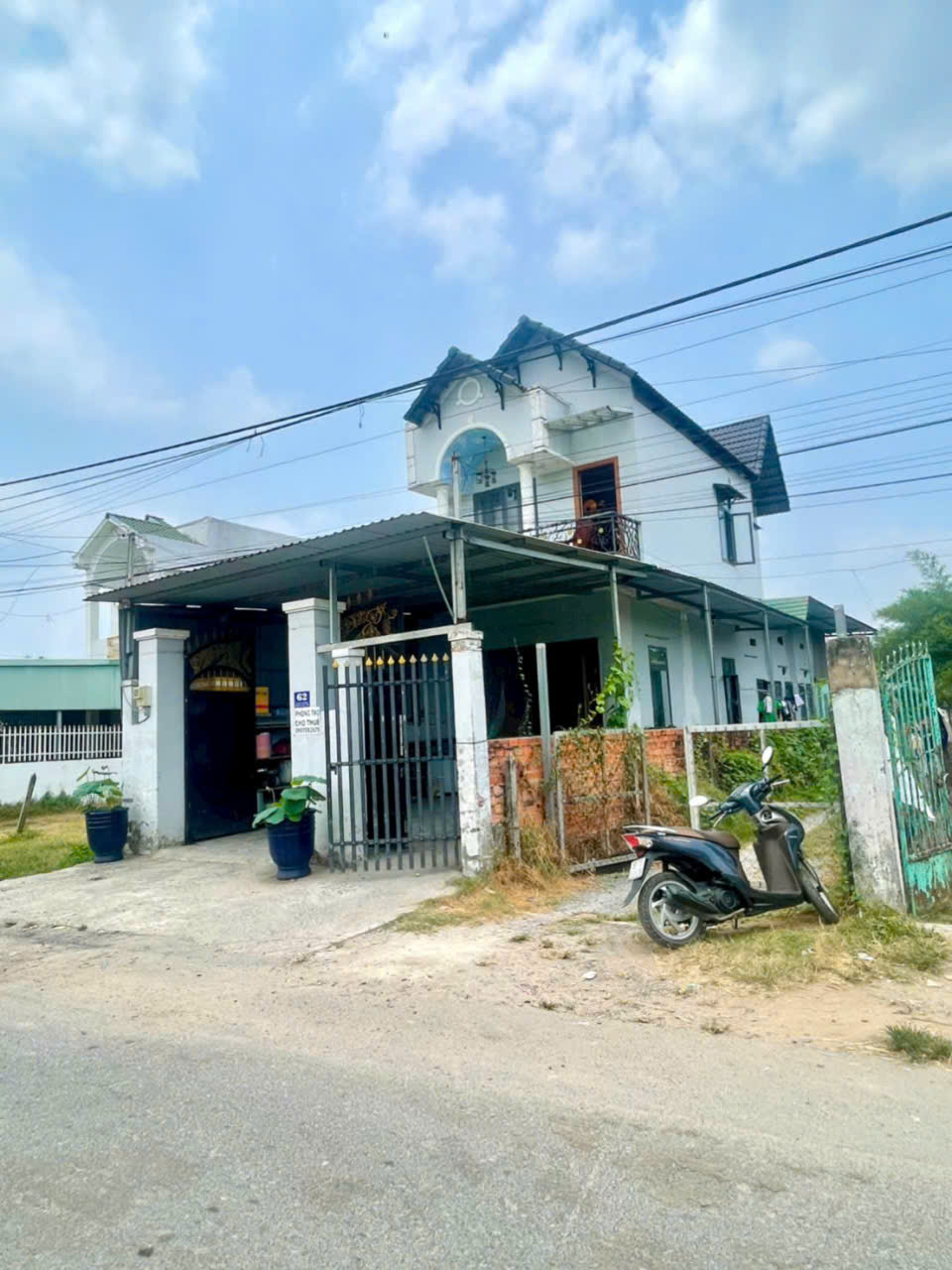 Bán nhà lầu góc 2mt đường nhựa / tỉnh lộ 15, xã Trung An dt 168m2 kèm 3 phòng trọ giá 3,8 tỷ