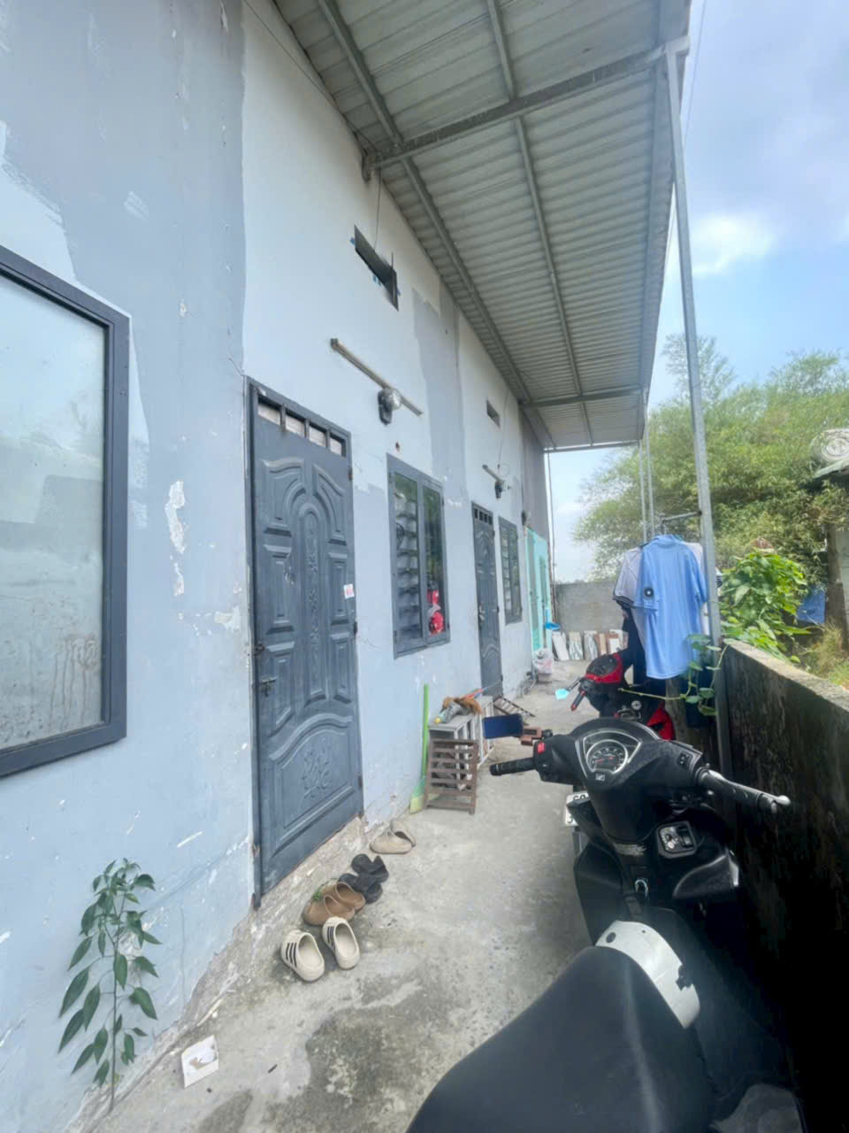 Bán nhà lầu góc 2mt đường nhựa / tỉnh lộ 15, xã Trung An dt 168m2 kèm 3 phòng trọ giá 3,8 tỷ 3