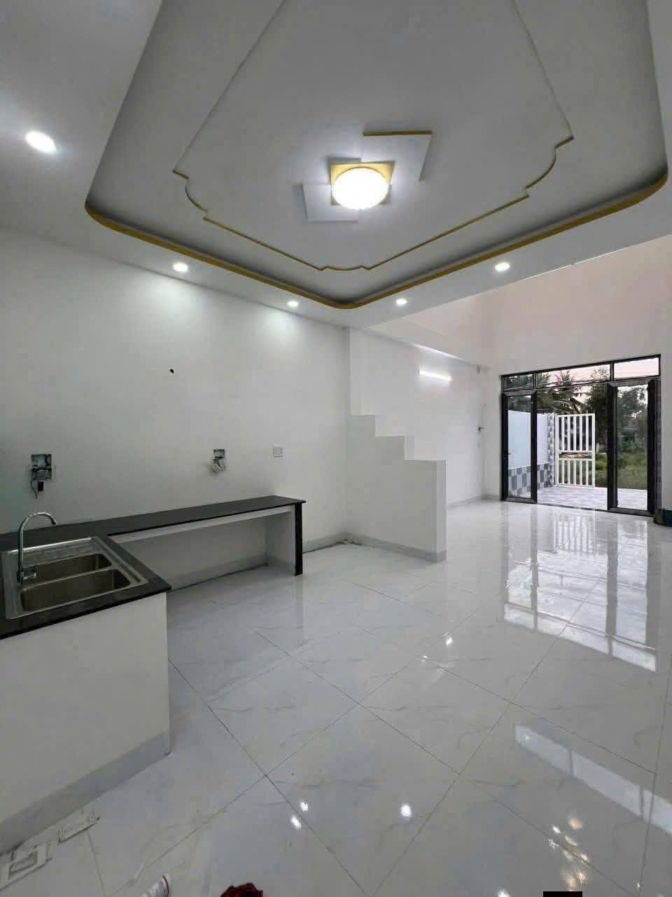Bán nhà mới xây xã An Thạnh, Bến Lức đối diện Waterproof dt 100m2, 1 lửng , 3pn,2wc giá 2,15 tỷ