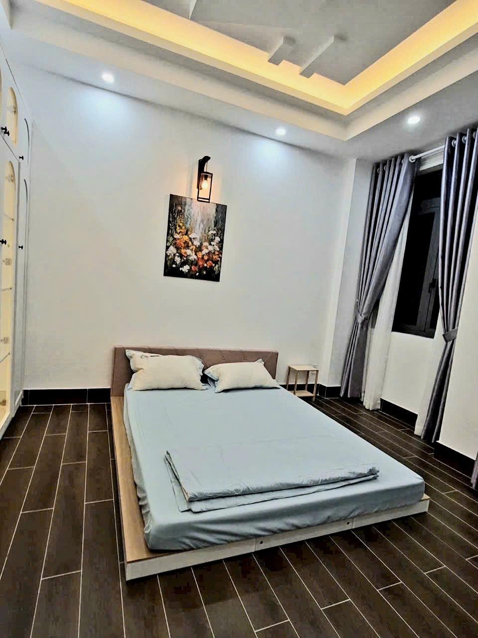 Nhà mới 3 tầng, hẻm xe hơi Huỳnh Tấn Phát, khu dân trí cao, 5 phòng, giá hơn 6 tỷ 3